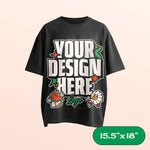 Oversized black t-shirt with large customizable design area on a beige background. 15.5"x18" label in corner.