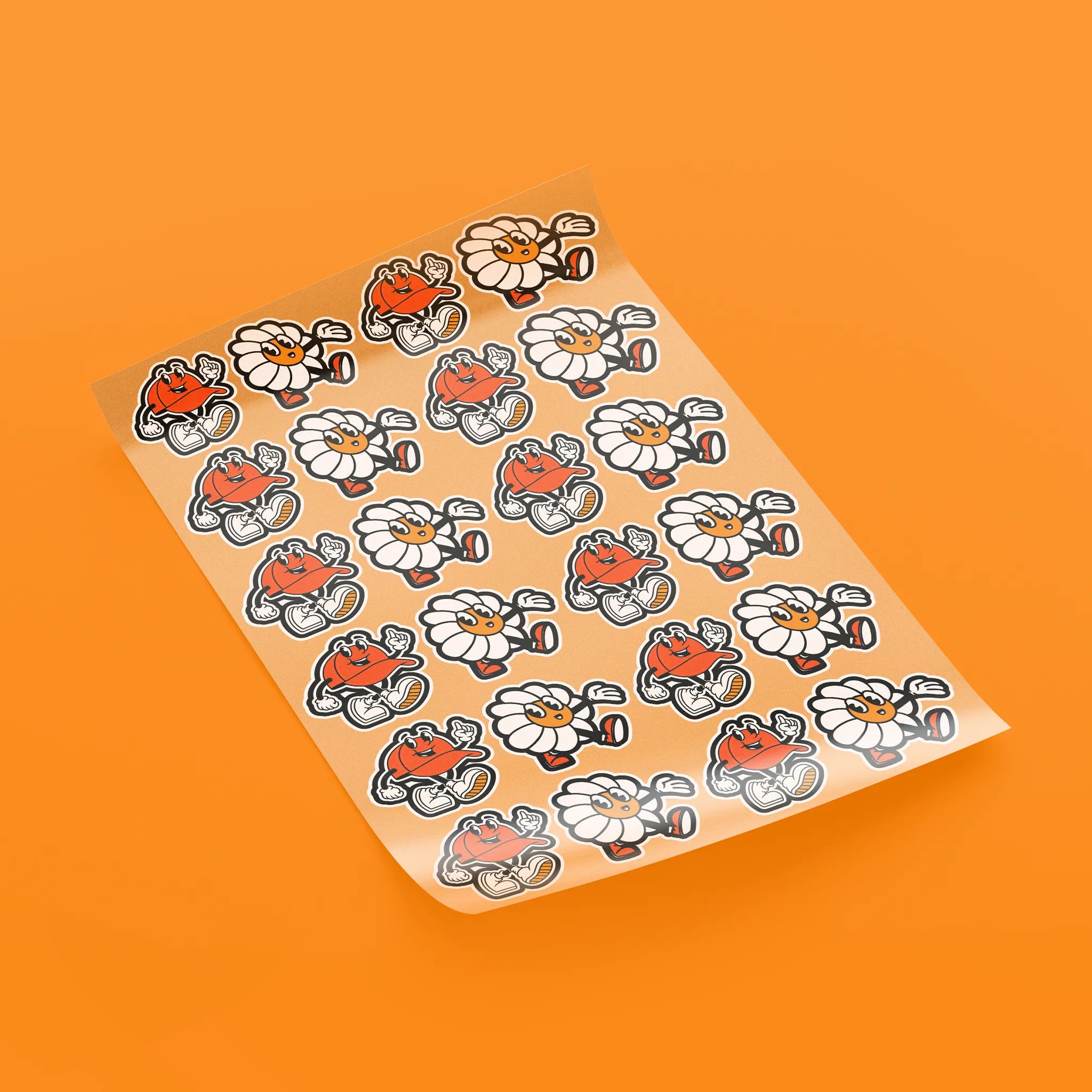 Direct-to-film transfer sheet with cartoon characters on an orange background