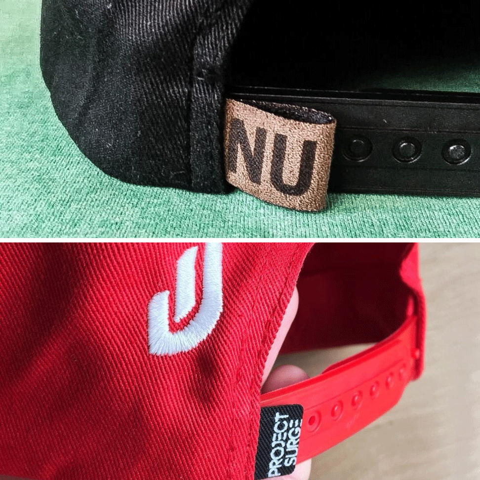 Black cap with miscrosuede Nu tag and cap with project surge digital print tag on green and brown backgrounds.