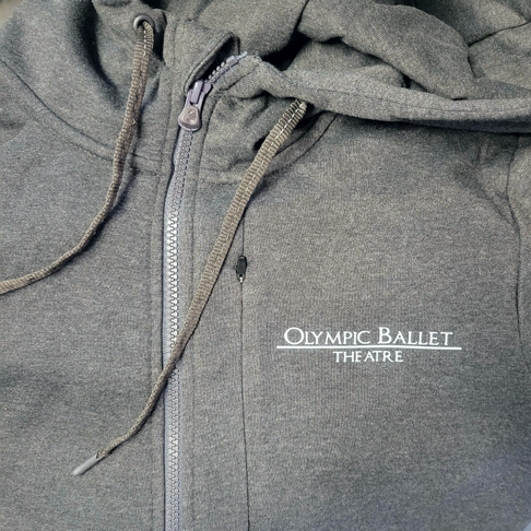 Olympic Ballet Theatre white logo on grey zip up hoodie.